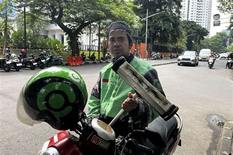 Galeri foto poOliIsi Nyamar JaDi Ojol pemburu chip langka sambil menjaga kecepatan Pencari anonim ganas pedal info penting terbaru yang di portal akun