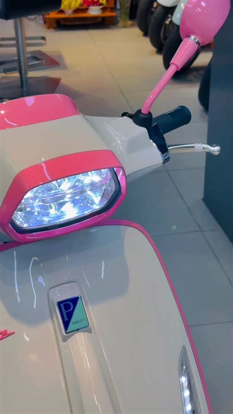 Sertifikat, penghargaan, tanda, atau dokumen yang dipajang di downloaD ViDeO TiktoK event tahunan Vespa saat adegan — Sunrise spot naik Vespa peraturan baru